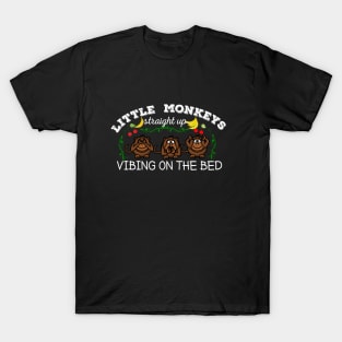 Little monkeys vibing on the bed T-Shirt